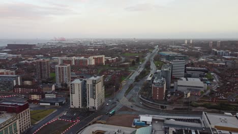 Aerial-view-across-landmark-Liverpool-city-skyline-empty-streets-during-corona-virus-pandemic-pan-left