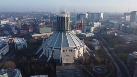 Liverpool-Metropolitan-cathedral-contemporary-city-famous-rooftop-spires-aerial-left-orbit
