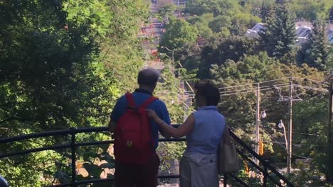 Older-couple-enjoy-nature-in-the-CIty-of-Toronto,-tourist