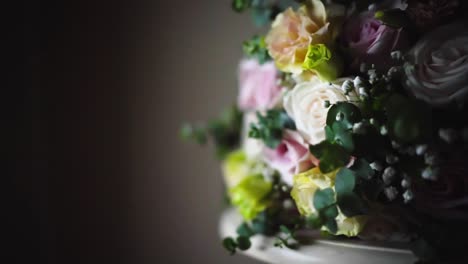 Wedding-day-flower-bouquet-on-table-close-up-panning-shot