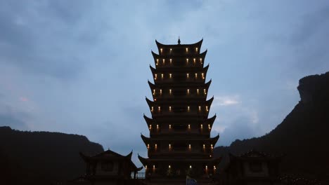 Wulingyuan,-China---August-2019-:-Crowds-of-people-leaving-the-Wulingyuan-exit-to-the-Zhangjiajie-national-park-in-the-evening,-Hunan-Province