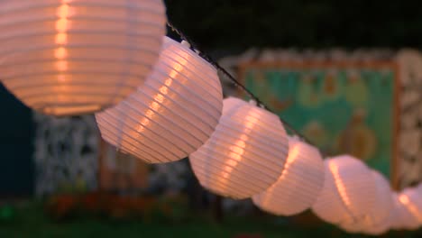 Outdoor-light-chain-in-summer-evening