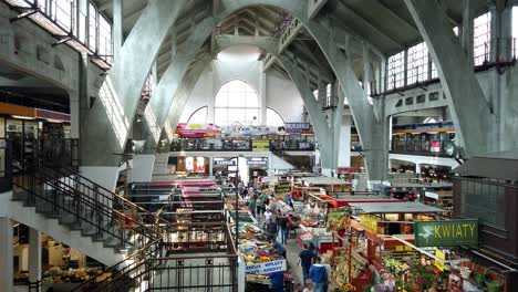 Famous-Wrocław-Market-Hall,-colorful-and-lively-bazaar,-Pan-shot