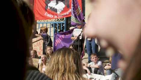 Youth-Climate-Strike-in-Sheffield-City-Centre-2019-in-front-of-the-City-Hall-with-speakers-and-representatives-young-and-students-and-older-adults