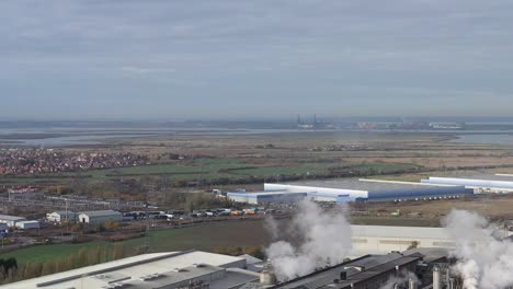 Aerial-establishing-shot-of-Morrisons-Distribution-Centre-in-Kemsley,-Sittingbourne,-UK-through-local-industry