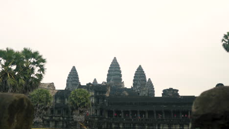 Timelaps-of-historical-temple-Angkor-Wat-with-alot-of-tourists-crossing