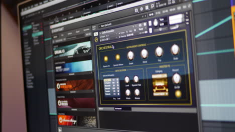 A-music-producer-using-digital-software-instruments-on-a-computer-screen-to-make-music