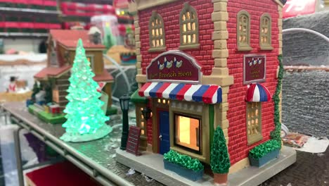 Christmas-Figurine-of-brick-building-in-store-with-Christmas-decorations