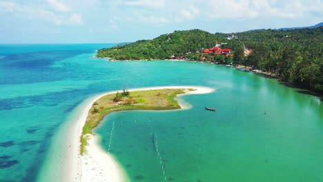 Koh-Phangan-Island-Beach-In-Thailand,-azure-calm-sea-water-and-natural-wave-breaker-sandbar
