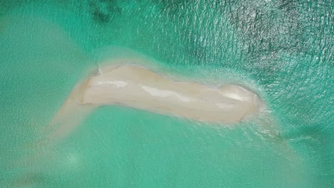 white-sand-beach,-a-sandbar-in-tropical-maldives-sea,-on-high-tide,-crystal-clear-waters,-High-angle-orbital