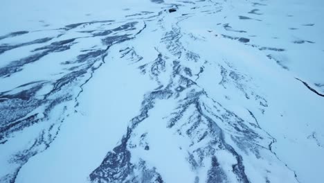 Frozen,-Snow-Covered-Landscape-of-Switzerland-Mountains,-Aerial