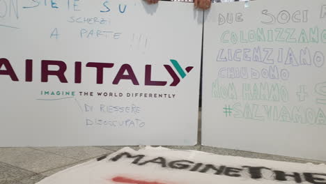 Panning-on-Air-Italy-banners-against-airline-dismissals