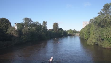 Slow-motion-of-a-group-of-rowers-rowing-into-shot