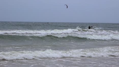 Two-man-kite-surfing-during-winter-on-Baltic-sea