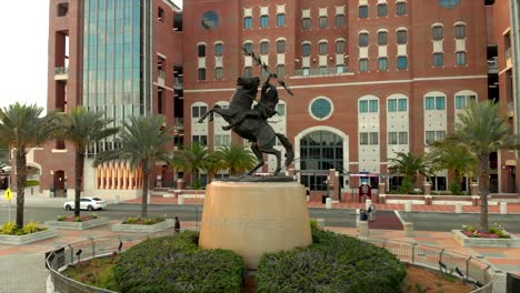 Aerial-View-of-Unconquered-Statue-at-FSU-Campbell-Stadium-During-Sunset