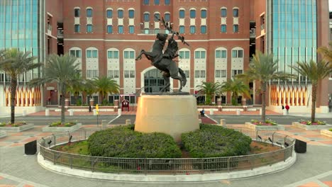 Aerial-View-of-Unconquered-Statue-at-FSU-Campbell-Stadium-During-Sunset