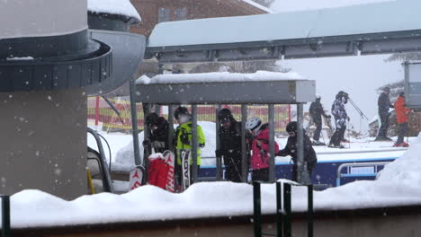 Skiers-entering-the-ski-lift.-Static,-slomo