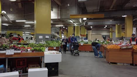 People-are-shopping-for-fruits-and-vegetables-at-Paddy's-Market-at-Market-City,-Sydney,-Australia