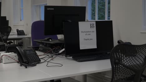 Close-Up-Of-Empty-Desk-And-Chair-In-Office-Building-During-Lockdown