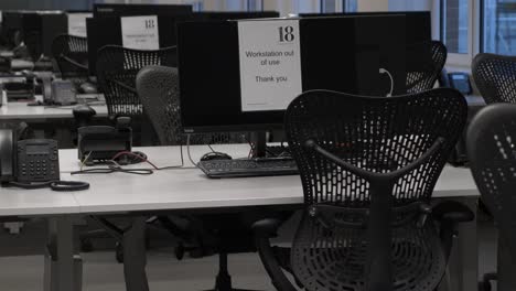 View-Of-Empty-Desks-On-Floor-Of-Office