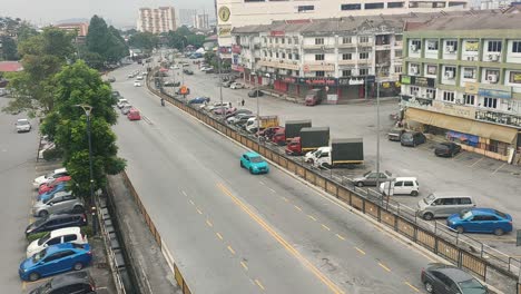 Luftaufnahme-Von-Straßennetzen-Und-Geschäften-In-Kleinen-Städten-In-Malaysia