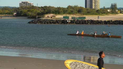 Dragon-Boat-Crew-Paddling-On-The-Coral-Sea---Currumbin-Alley---Surfing-At-Currumbin-Beach---Gold-Coast,-QLD,-Australia