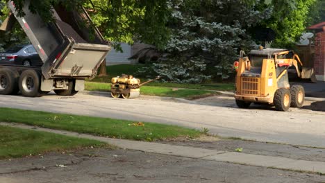 Fast-motion-footage-of-a-paving-crew-working-on-a-residential-driveway