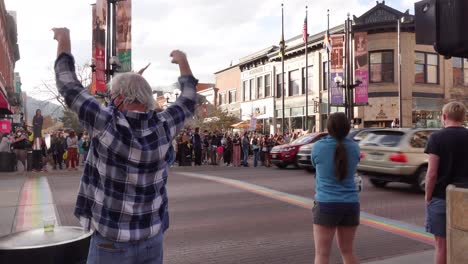 People-celebrating-Joe-Biden's-election-victory-in-the-streets-of-Boulder,-Colorado