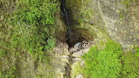 Aerial-view-of-small-tropical-waterfall-in-the-rainforest