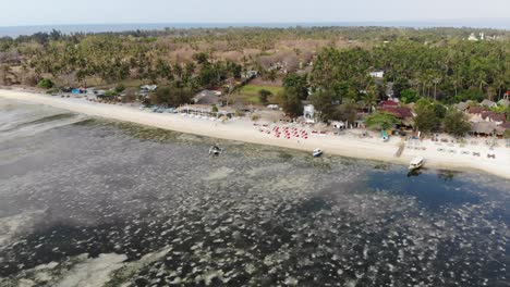 Drone-shot-of-Gili-Air-island,-Indonesia,-on-a-hot,-sunny-day