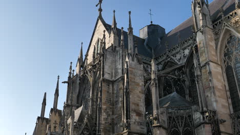 Gimbal-tilt-up-shot-of-Basilica-of-San-Urban-of-Troyes-on-sunny-day