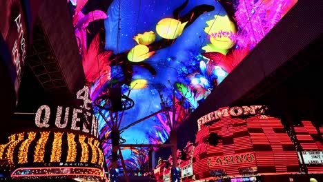 Colorful-giant-screen-over-The-Fremont-Street-Experience-and-empty-street