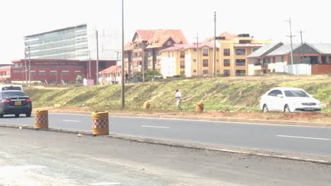 African-major-road-traffic-urban-scene,-Nairobi-Southern-Bypass-Highway,-Kenya