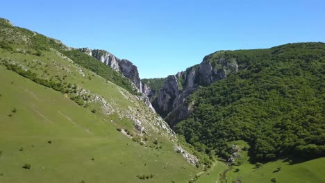 Beautiful-scenic-aerial-view-approaching-Turda-Gorge-in-Transylvania,-Romaia