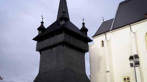 wood-tower-at-church-in-Hungary,-Nyírbátor