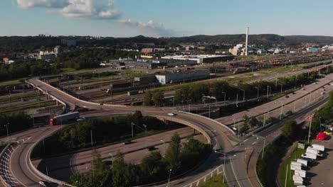 Aerial-view-of-the-big-roundabout-over-the-big-road-Alingsasleden-E20-located-in-Gothenburg,-Sweden