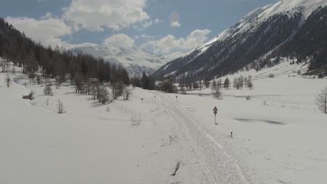 Ski-tour-and-cross-country-ski-routes-in-Livigno,-Italy-in-direction-to-Passo-Forcola