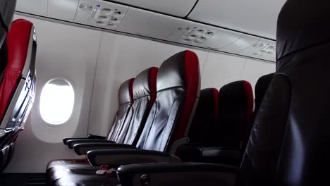 empty-seat-inside-commercial-airplane-cabin