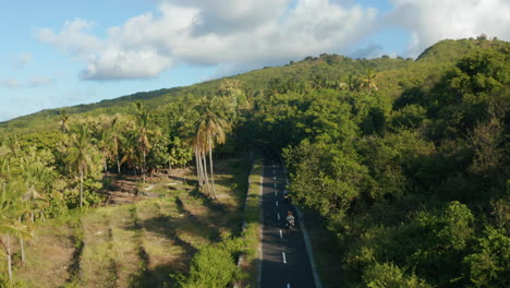 Aerial-footage-of-people-is-driving-the-motorbike-in-Nusa-Penida-Island