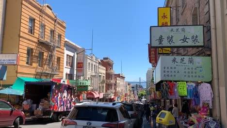 Busy-street-scene-with-tourists-and-locals-walking-down-San-Francisco's-famous-landmark---Chinatown