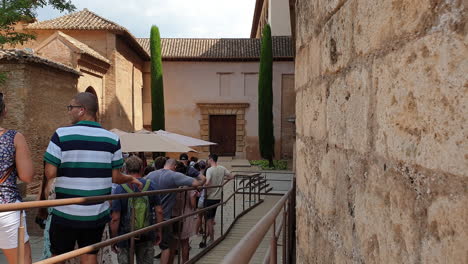 People-queue-for-entrance-in-Alhambra,-Granada,-Spain