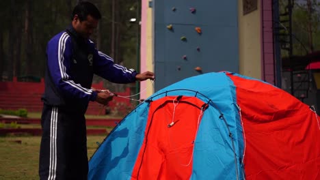 Tent-pitching-by-Himalayan-mountaineers-for-their-stay-in-upper-Himalayas-snowy-peaks