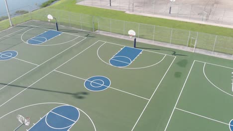 200"-high-smooth-aerial-of-basketball-court-orbiting-in-a-smooth-movement