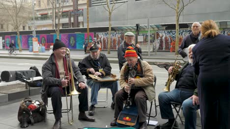 eledery-group-busking---street-performance-in-melbourne-CBD-a-group-of-busker