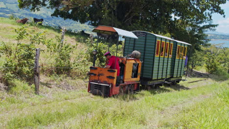 Shot-of-small-old-fashioned-train-in-Arenal-national-park-in-Costa-Rica
