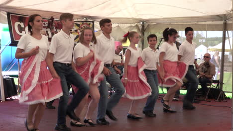 Kutztown,-Pennsylvania---July-1,-2019:-young-people-dancing-at-the-Kutztown-Fair-in-Kutztown,-Pennsylvania-on-July-1,-2019