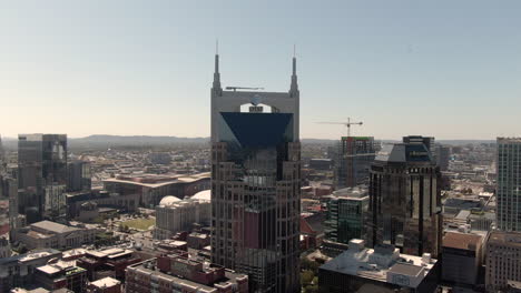 4k-aerial-pedestal-downwards-of-AT-T-building-in-Nashville,-Tennessee-on-a-clear,-fall-day