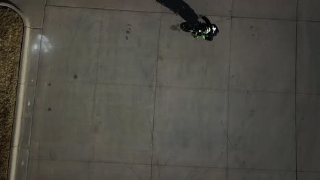 Aerial-Drone-Shot-of-a-motorcycle-doing-circular-wheelies