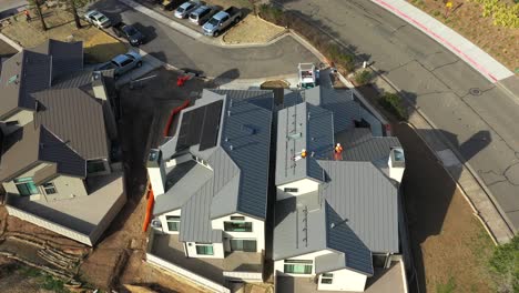 Men-prepping-roof-of-new-home-for-solar-panel-installation