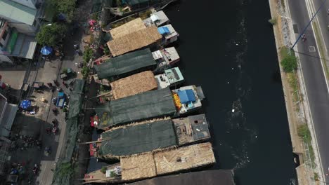 High-angle-Aerial-view-of-floating-flower-market-in-Saigon-or-Ho-Chi-Minh-City-in-Vietnam